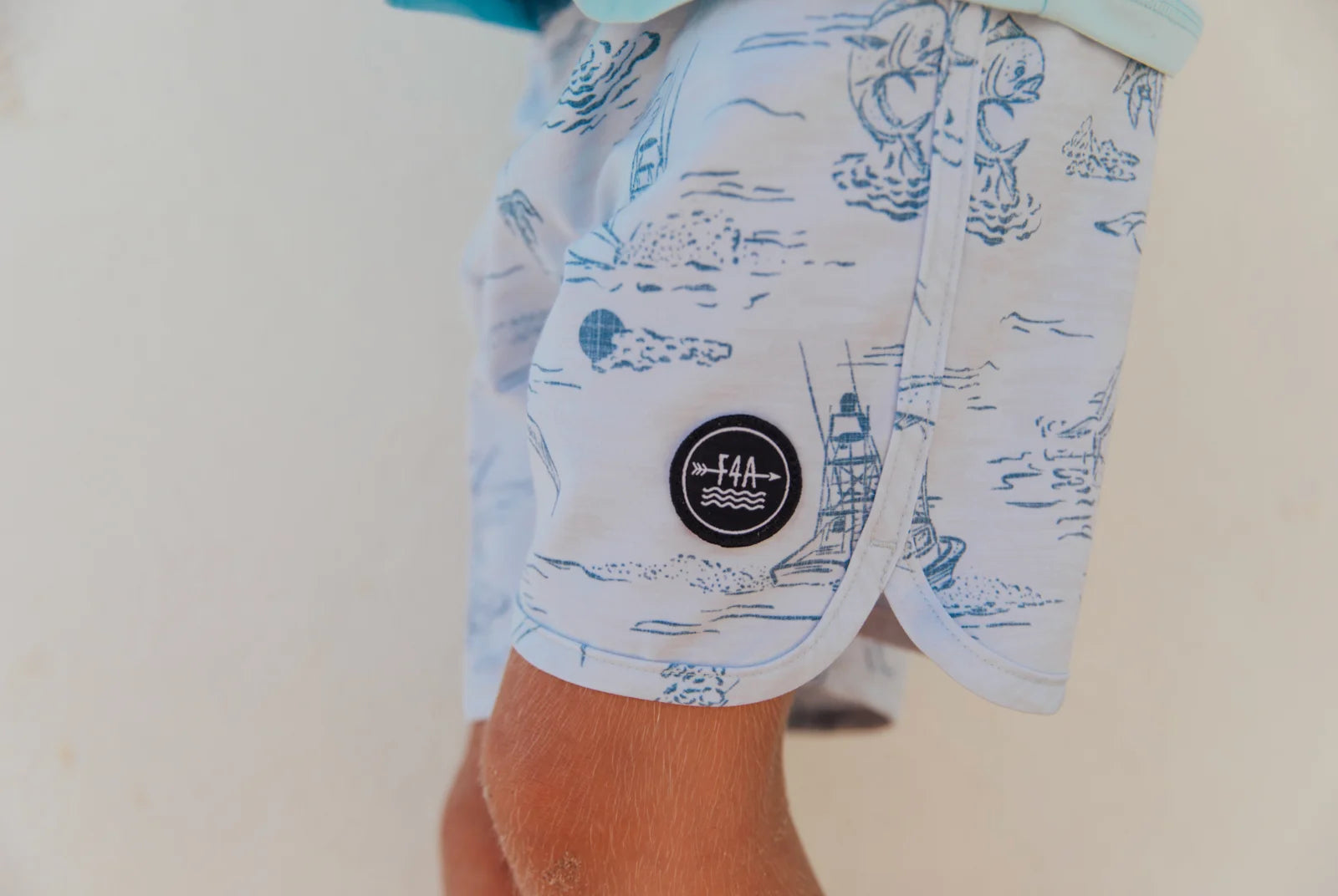 Feather 4 Arrow | Scallop Boardshort | Cloudy Sky | Model | Side | Vagabond | Apparel | Boutique