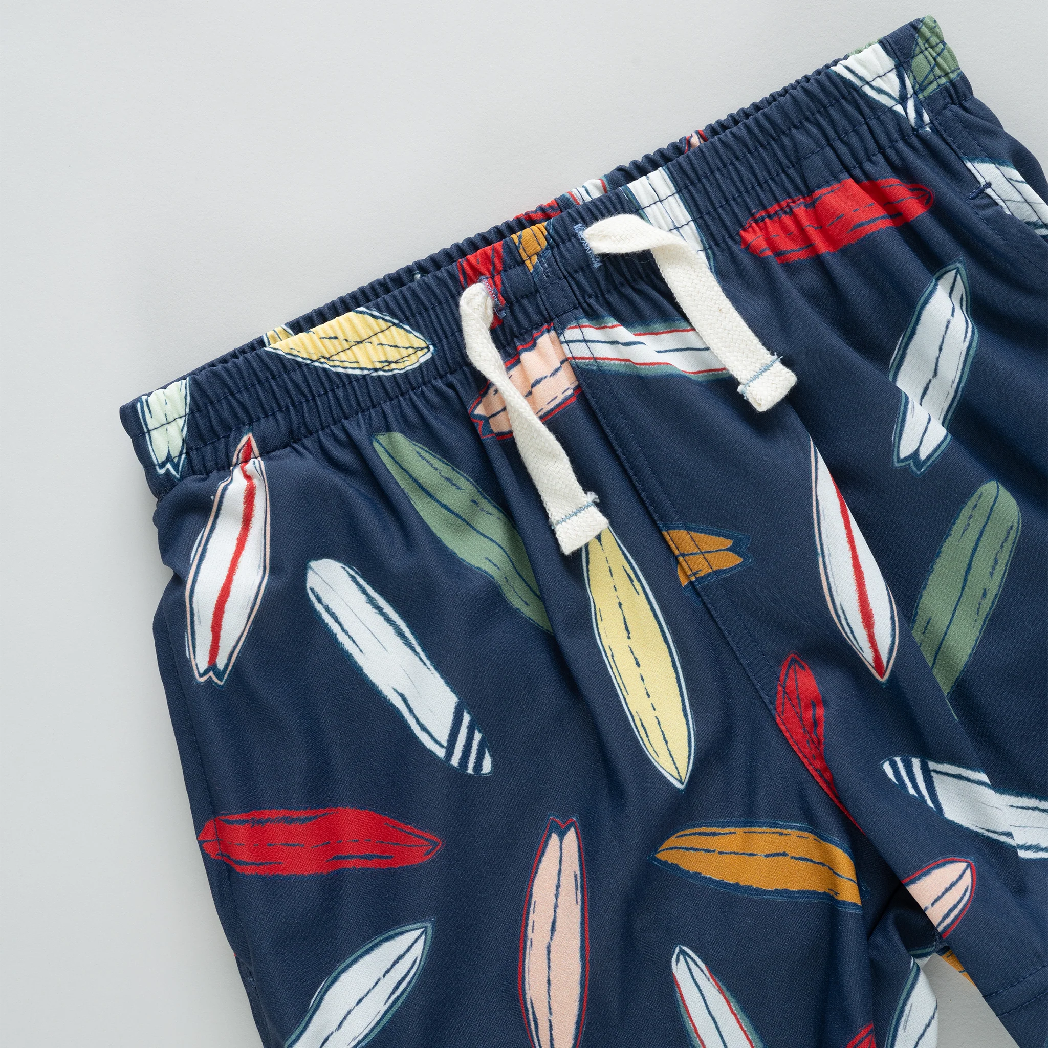 Pink Chicken | Surfboard Swim Trunks | Close | Vagabond | Apparel | Boutique