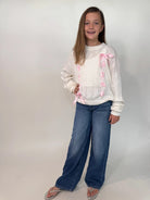 DL1961 | Girl Nini Wide Leg Low Rise Jean | Model | Full | Vagabond | Apparel | Boutique