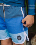 Feather 4 Arrow | Scallop Boardshort | Navy | Close | Model | Vagabond | Apparel | Boutique