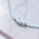 Haven | Good Luck Fish Bahama Wood Bead Necklace | Vagabond | Apparel | Boutique