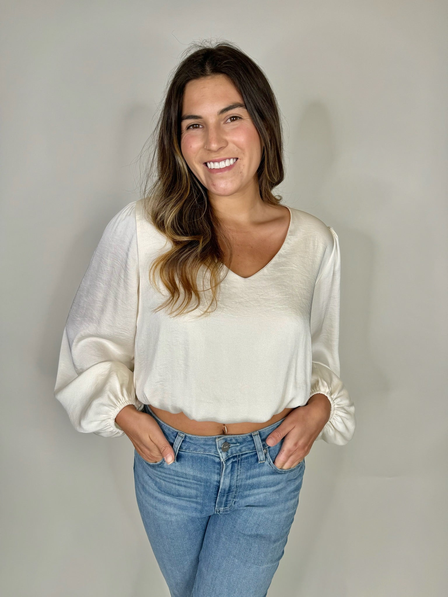 KLD L/S Washed Satin V-Neck Bubble Hem Blouse | Vagabond Apparel Boutique