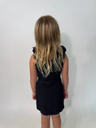 Little Olin | Ruffle Dress Black | Model | Back | Vagabond | Apparel | Boutique
