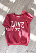 Oat Collective Kid | Love Bow Graphic Sweatshirt | Front | Vagabond | Apparel | Boutique