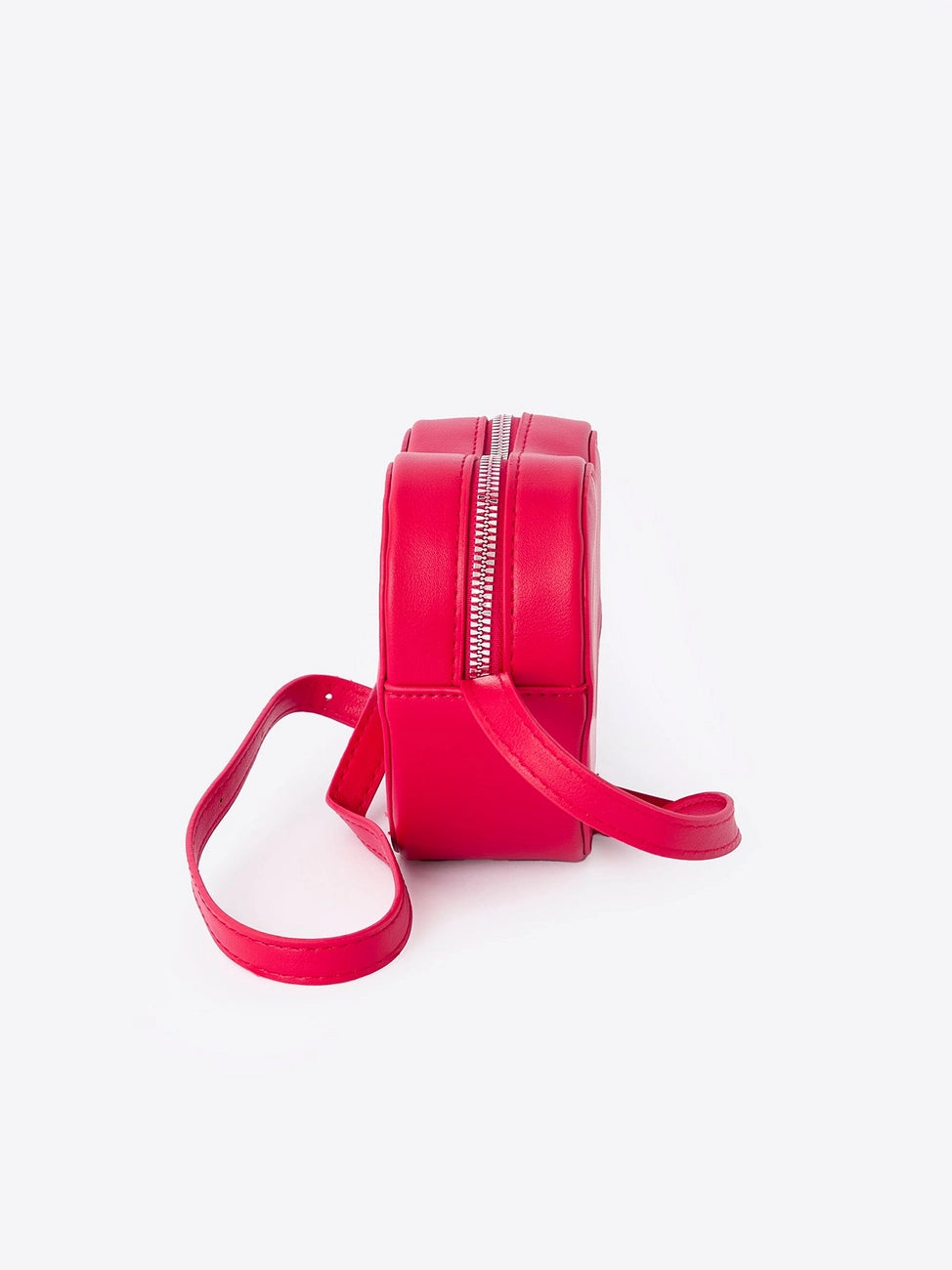 Rylee Faith Designs | Heart Crossbody Bag | Side | Vagabond | Apparel | Boutique