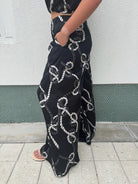 KLD | Printed Satin Wide Leg Pants | Side | Vagabond | Apparel | Boutique